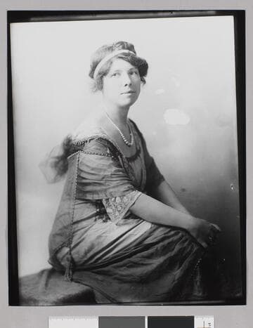 Portrait of Charmian London with necklace and headband