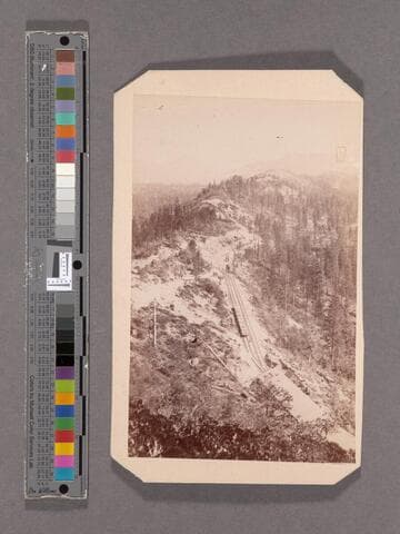 Emigrant Gap Ridge. 84 miles from Sacramento. Old Man Mountain, Red Mountain, Castle Peak in Distance