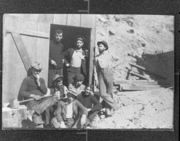 An unidentified foreman and group of engineers at Santa Ana River #1 Hydro Plant during its construction