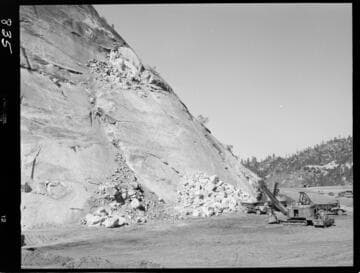 Big Creek - Mammoth Pool - Cleanup of shot rock from west abutment blister
