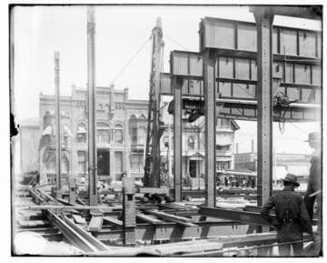 A construction crew building the Fourth Street General Office Building