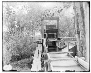 An automatic rubbish rake along the canal line at Santa Ana River #1 Hydro Plant