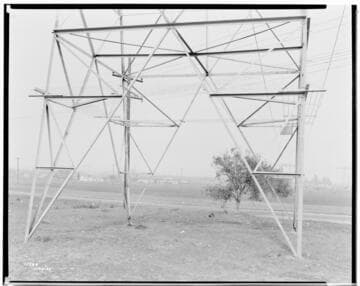 Eagle-Bell Transmission Line - Barbed wire barrier on tower