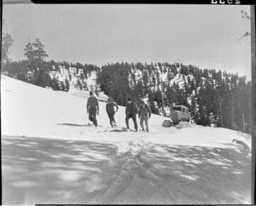 Big Creek snow survey.  four men break snowshoe trail for Sno