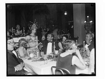 People sitting at a table at the Club Casa del Mar, Santa Monica, California