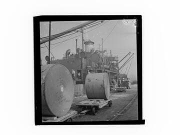 Rolls of newsprint unloaded at the dock, Port of Los Angeles