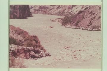 The capsized "Bootoo" after going through the coxcomb at the foot of Vulcan Rapid