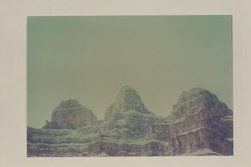 Down Grand Canyon to "The Bells" which are up river from the mouth of Spencer Canyon