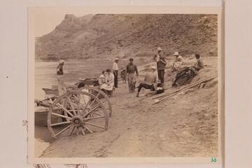 Launching and loading skiffs for the Dusty Dozen cruise of 1934.  Bus Hatch moves toward camera at center, Frank Dodge at Bus' left
