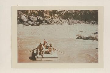 Nevills working one of his sadirons into the eddy below Vulcan Rapid after lining.  Joe Desloge and Margaret Marston on the stern