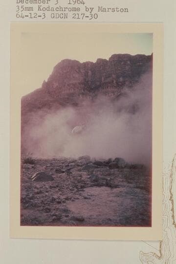 Chopper lifting dunnage out of 217 Mile Canyon fan