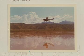 Chuck Rowland flies in to check progress on Lake Mead