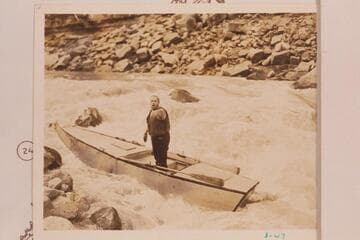 "Big Joe" Russ Frazier tells them at little rapid below North Canyon, 21 Mile Rapid