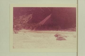 Upper Disaster Rapid.  Bill Davis in the first rubber boat, Mildred Davis is handling the second boat.  Photo from right bank