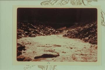 Les Jones upsetting in the rapid at Mile 209 at the right side of the island