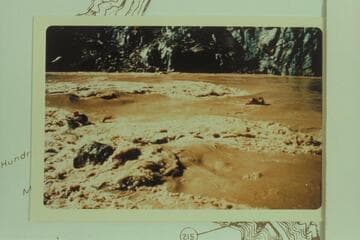 Homer Morgan and Jorgen Visbak floating through rough water near Mile 212.15