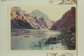 Upriver from mouth of Diamond Creek showing Bill Mooz and Harvey Butchart checking the boats to be used in crossing the river