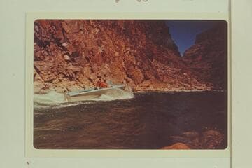 Buzz Belknap runs down Gneiss Canyon Rapid in Mack Miller's Turbocraft