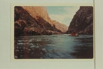 Upstream to rapid at Mile 232 1/4, which is 232 Mile Rapid