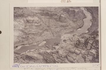 Rapid at Mile 184.  The 184 mile point is halfway down rapid.  This rapid is Chenoweth-Hoyt #43.  The island is 0.2 miles down stream and the rapid at the lower end of the island is #44.  The river passes from the photo at left at Mile 183.6
