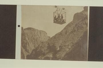 Rust Cable Car in transit across the Colorado River