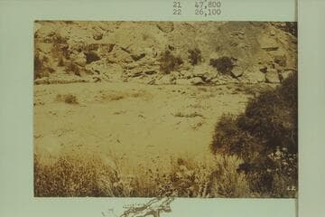 Vulcan Rapid during the flood of 1923, Sep., when the USGS party was at this point [on photo reverse:  The front of Lava Falls]