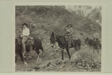 Marion Hudson (center) rides in at Bright Angel Creek