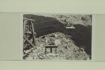 Johnny Maxson watches arrival of skip on cable at Hermit Camp