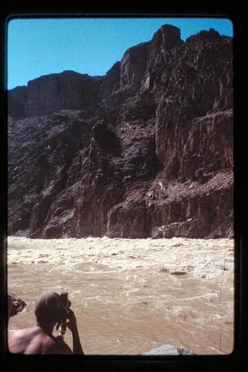 "Wee Red" climbs Monument Creek Rapids