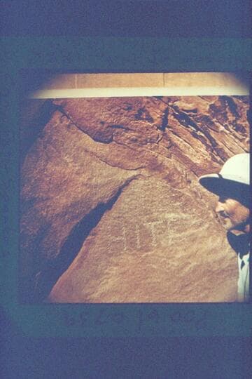 Harry Aleson at the Hite 1885 inscription at Mile 143.9, right bank in Glen Canyon