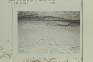 "CHAS. SENSIBAUGH AUG. 1945" inscription near the ruin below the window in Davis Gulch