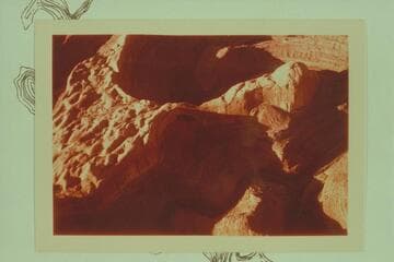 Down Escalante River.  The mouth of Stevens Creek is at lower right, Stevens Arch is in the shadow at center