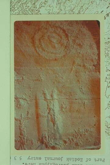 Petroglyphs in Escalante Cave (?) above forks of Wilson Canyon