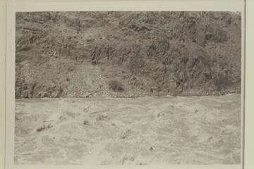 Elden McArthur at the oars of the "Doris" in Dubendorff Rapid