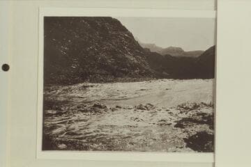 Pipe Creek Rapid in high water.  Zoroaster Temple is almost hidden at upper center