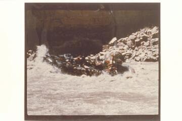 Georgie White's pontoon rig in Dark Canyon Rapid