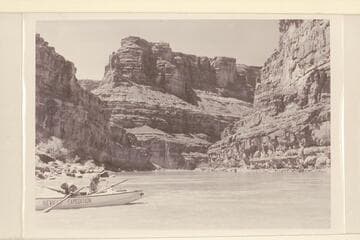 Dock and Margaret Marston in the "Joan" in Cataract Canyon.  Down river to Dark Canyon from approximately Mile 183 1/2
