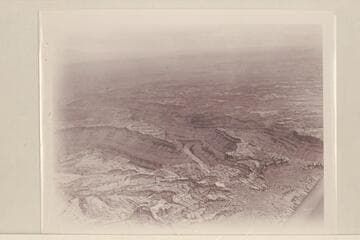 Junction of Colorado and Green Rivers.  Land of Standing Rocks.  The Colorado flows from upper left to be joined by the Green from left and flow into Cataract Canyon at right.  The Junction is at center.  River leaves picture at right at ca. Mile 215