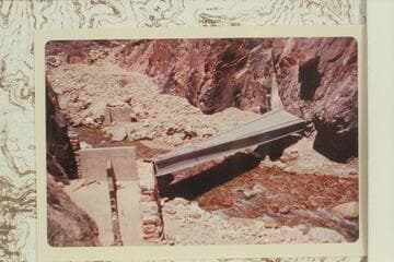 Aluminum bridge after 1966 flood in Bright Angel Creek had wrecked it.  Located in The Box