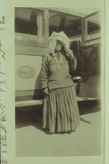 Squaw pictured by the bus between Grand Canyon and Navajo Bridge at time of the Bridge dedication.  Print from Freeman collection