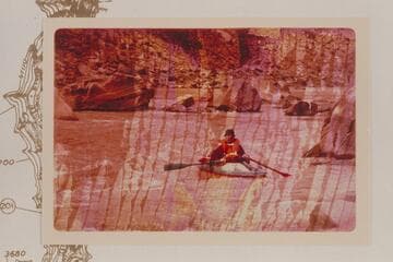Dock Marston runs Rapid No. 17 in a Sportyak while Buzz Belknap watches from above.  The film was wet in his capsize in Rapid 22 and the number sequence is subject to doubt