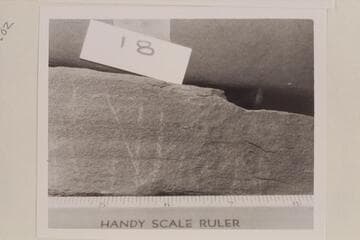 Light scratches on #8 rock taken from the Fort at the mouth of White Canyon.  #18 may read "Julian"