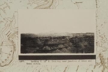 North 15 degrees east from the top near junction of Grand and Green Rivers