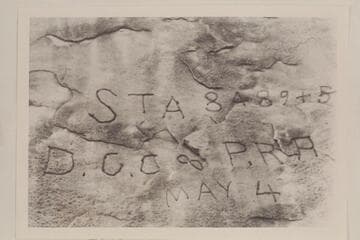 Inscription on large boulder at right bank of Colorado RiVer below mouth of Green RiVer and marking the start of the Stanton part of the rail surVey for the D.C.C. & P.R.R