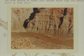 Rapid #4 which heads at Mile 211.10 and drops 8' in 0.25 miles.  The side canyon at upper left drains North Flat and enters the river at Mile 210.7