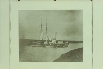 Schooner "Isabel" discharging cargo into a barge and river steamer at Port Isabel