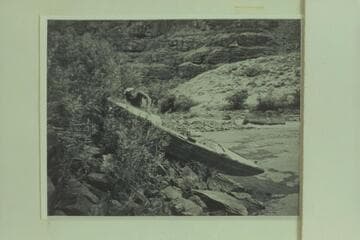 The "Illinois Girl" found on the upper Green River.  She had been abandoned by Tony Backus.  Holmstrom examines the wreck