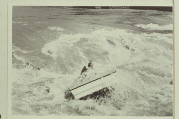 Wayne McConkie dropping down the left side of Ashley Rapid in one of the Mexican Hat Expedition sadirons. Morning