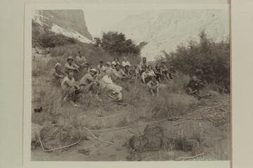 The crew of the motor boat visiting with some of the Bundy family at the foot of Whitmore Trail; Mile 188