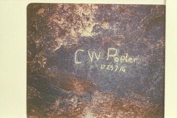 Inscription at the side canyon at Mile 73.5.  C. W. Potter of Bush party